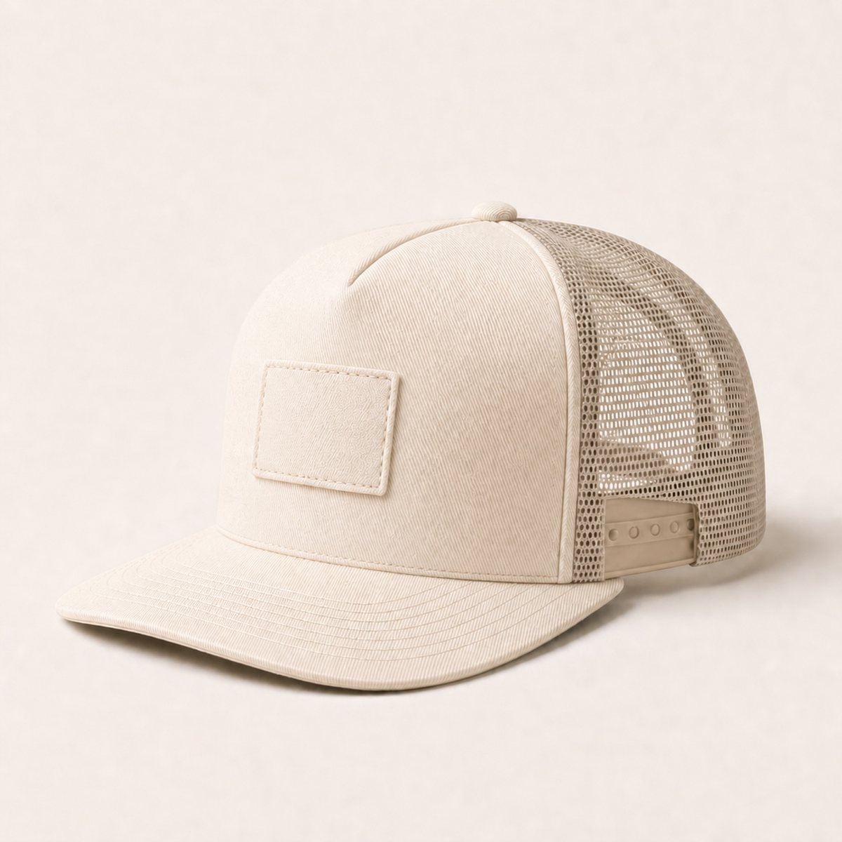 Recycled mesh trucker cap with a woven patch